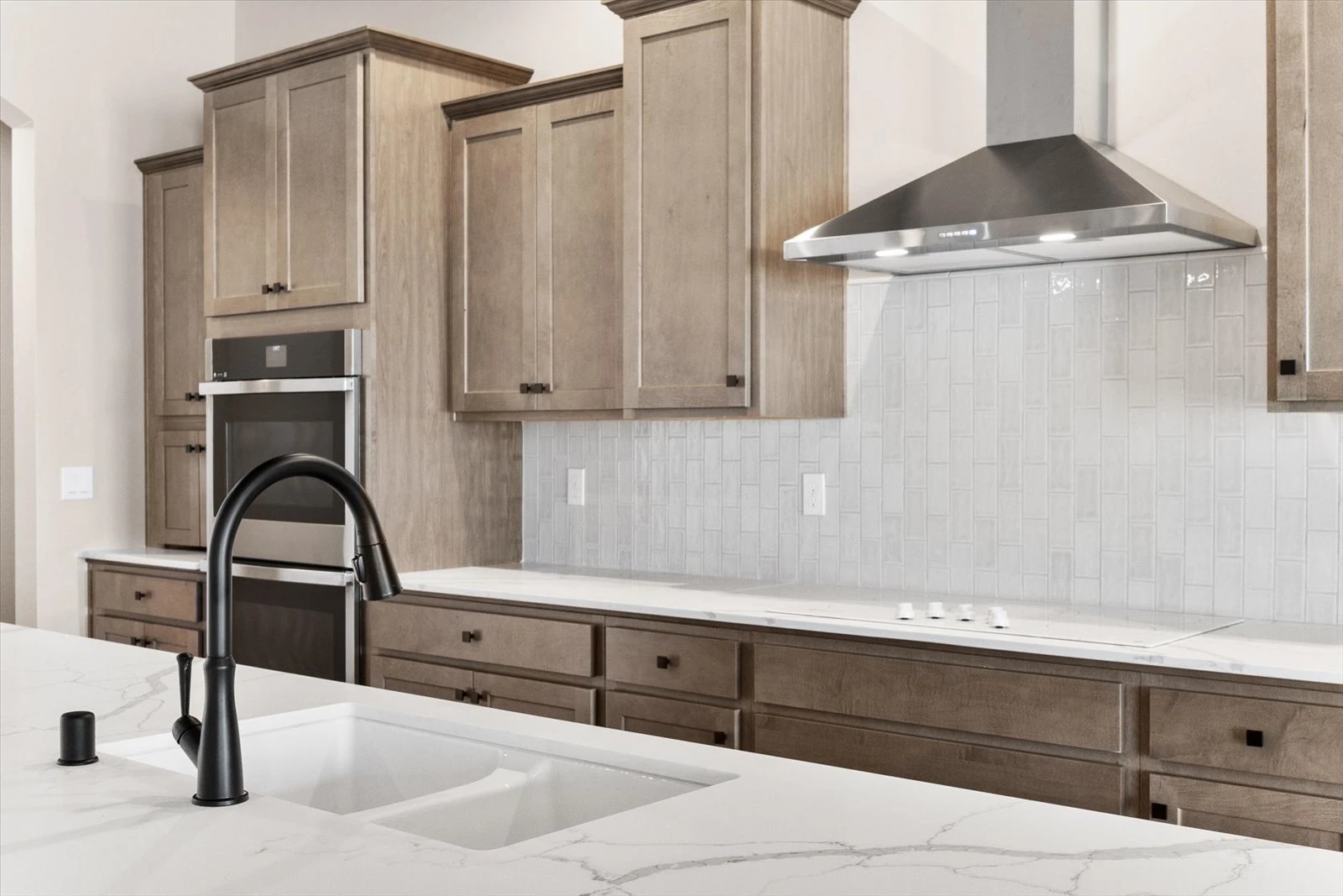 Close-up of kitchen countertops, cabinetry, and designer finishes in a Vista Montaire home